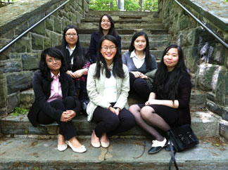 The Midwood SMART takes a break in a Riverdale park after their presentation at the Fieldston School
